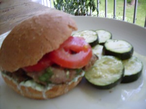 Lamb burger with grilled zucchini.